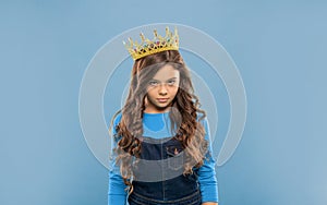arrogant princess in tiara. proud kid with curly hair. egoistic teen girl wear diadem.
