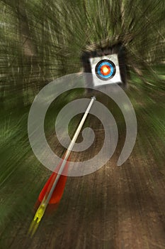 Arrow flying towards archery target