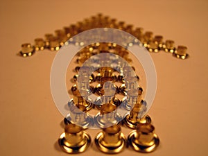 Arrow of gold rivets