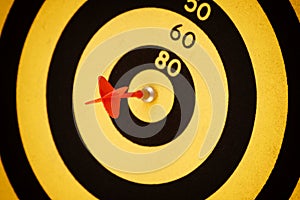 Arrow hit black and yellow Bullseye