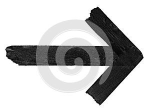 arrow made of black masking tape isolated on white background