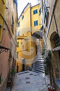 Arrow pass ways in old part of Vernazza village in Cinque Terre coastal area. Liguria, Italy