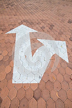 Arrow traffic symbol on Hexagonal block