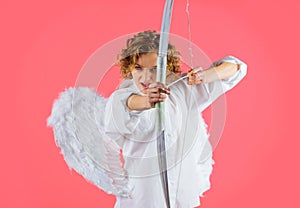 Arrows of love. Female angel in angelic wings shooting with bow. Valentines day cupid. Love concept.