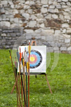 Arrows and target archery in field photo