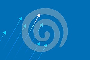 Arrows up on blue background, copy space composition, business growth concept.