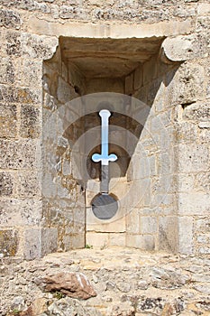 Arrowslit was drilled in ramparts in Falaise (France)