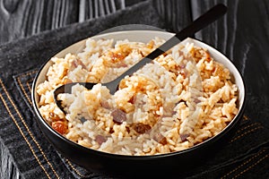 Arroz Con Coco Traditional coconut Rice Dish From Colombia close-up in a bowl. horizontal photo