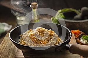 Arroz con coco, Traditional Colombian dish. Typical latin recipes with rice an fruits photo