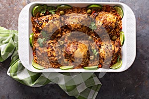 Arroz con pollo in a baking dish photo