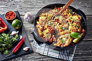 Arroz con pollo, chicken with rice and veggies