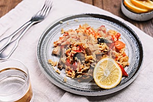 Arroz con verduras y azafran, spanish dish. Vegetarian risotto with  vegetables, champignons and saffron