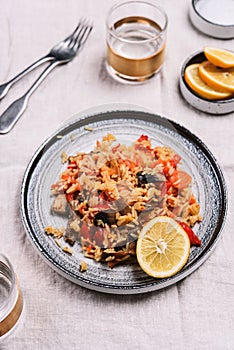 Arroz con verduras y azafran, spanish dish. Vegetarian risotto with  vegetables, champignons and saffron