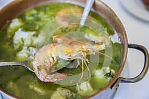 Arroz de Tamboril or soupy seafood rice, portuguese recipe