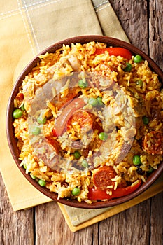 Arroz Valenciana with rabbit, chorizo, vegetables and spices in