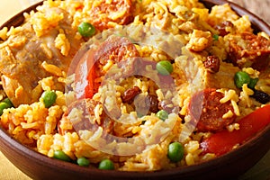 Arroz Valenciana with rabbit, chorizo, vegetables and spices mac photo