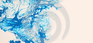 Art Abstract flow pour acrylic  marble painting. Blue and beige color wave texture blots horizontal long background
