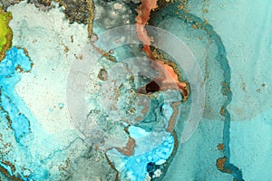 Art Abstract paintin blue and gold blots landscape background. Alcohol ink colors. Marble texture