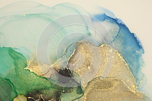 Art Abstract  watercolor flow blot painting. Color canvas marble texture background. Gold, blue and green Alcohol ink