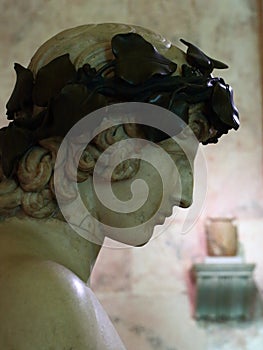 Art of Ancient Rome. Antinous in the image of Dionysus with a bronze wreath, close-up