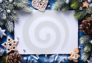 Art Christmas background with gingerbread cookies and festive decora