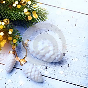 Art Christmas holidays decoration. Christmas and New Year holidays background with Christmas Tree and holiday light, winter season