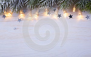 Art Christmas tree light Background With Frost Fir Br