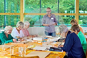 Art class with six students and teacher