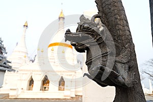 Art creature along pillar in Thai temple