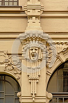 Art deco style decorations with screaming mans face