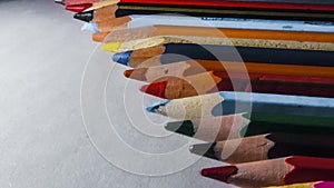 Art and drawing creative concepts of colorful crayon pencils with triangle shape on white background with copy space Top view,