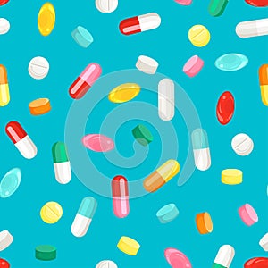 Colorful pills and capsules on blue background. Medication seamless pattern.