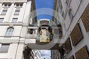 Art Nouveau anchor clock between houses above the street on the Hoher Markt in Vienna