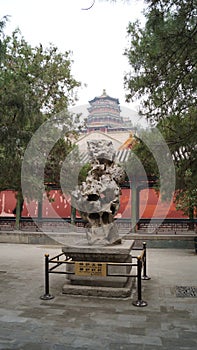 Art object on the background of the Tower of Buddhist incense in the Summer Palace. Beijing, China