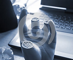 Art Object human hands printed 3D printer. Model prototype of human hand printed
