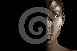 Art photo of Africal woman with tribal ethnic paintings on her face