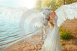 Art photo real people Fantasy woman royal queen hand strocking white horse with wings pegasus animal myth elf girl sexy