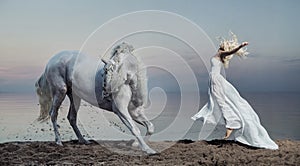 Art photo of the woman with strong horse