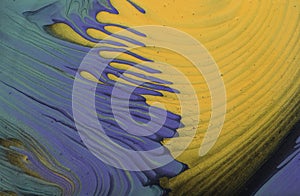 Art photography of abstract marbleized effect background. Gold and purple, black, green creative colors. Beautiful paint