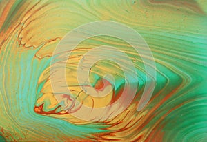 Art photography of abstract marbleized effect background. Turquoise, green, gold and blue creative colors. Beautiful paint