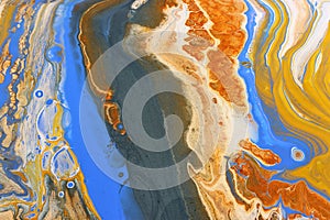 art photography of abstract marbleized effect background with yellow, blue, gold and copper creative colors. Beautiful paint