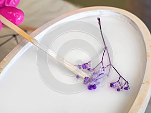 The art process of pouring epoxy resin into a wooden toy. Techno