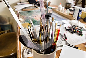 Art school with a colorful collection of brushes