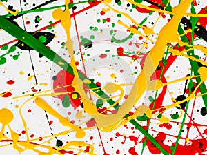 Art splashed spilled yellow green red black paint. expressionism