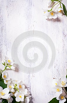 Art spring flowers frame on old wood background photo