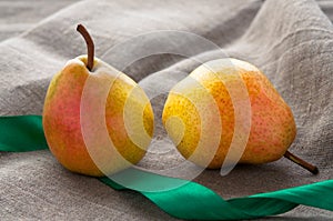 Art still life with small red pears and green