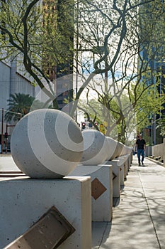 Art stone sphere and trees ind downtown pheonix arizona