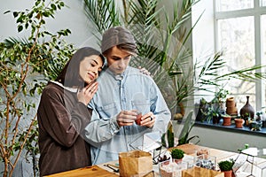 In an art studio, two creative