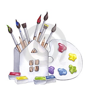 Art supplies set colored paint palette paintbrushes in white ceramic house cuvettes tempera gouache acrylic oil. Hand
