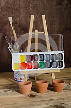 Art supplies. Watercolor paint, brushes, Photography.